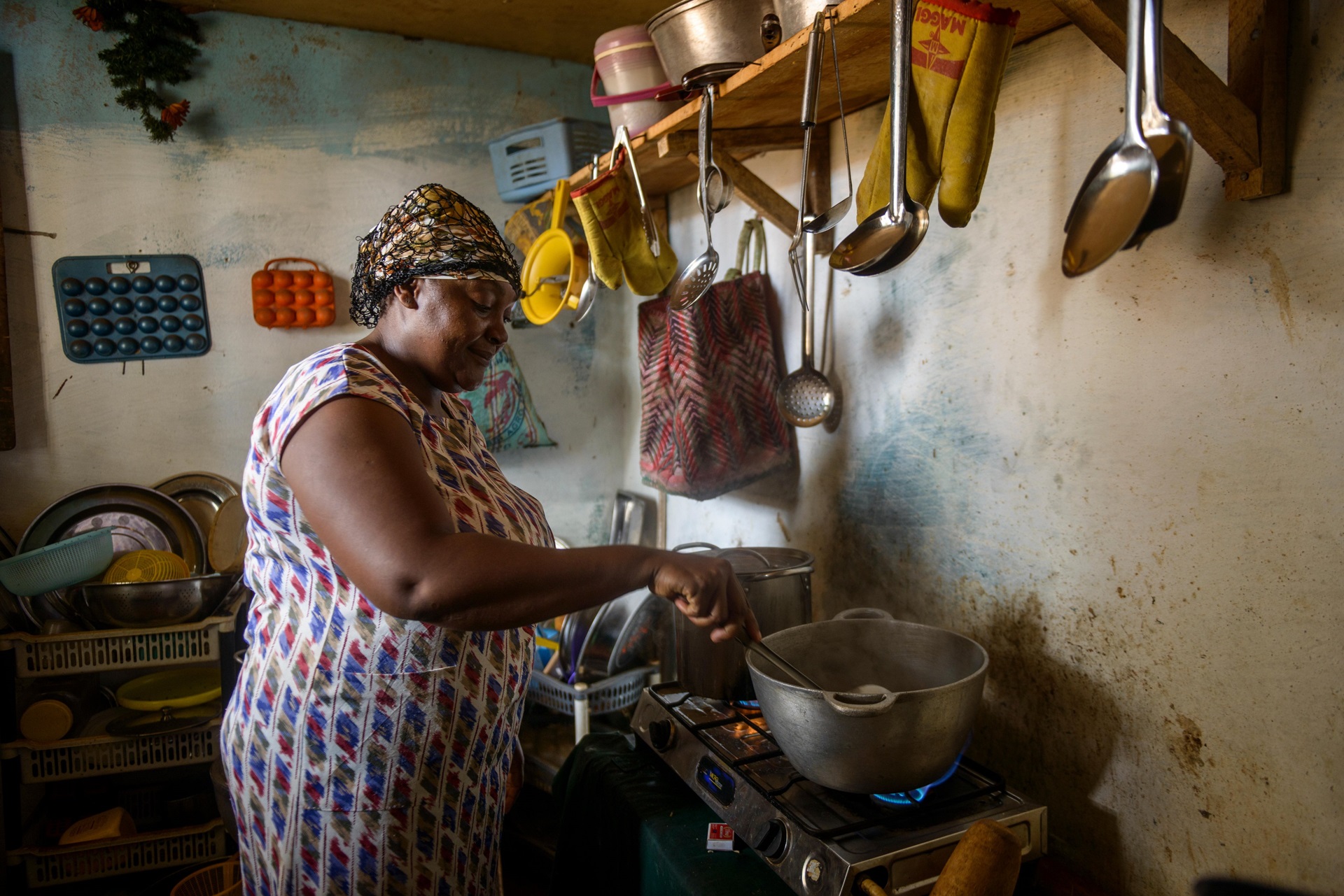 Woman cooking on clean stove Clean Cooking