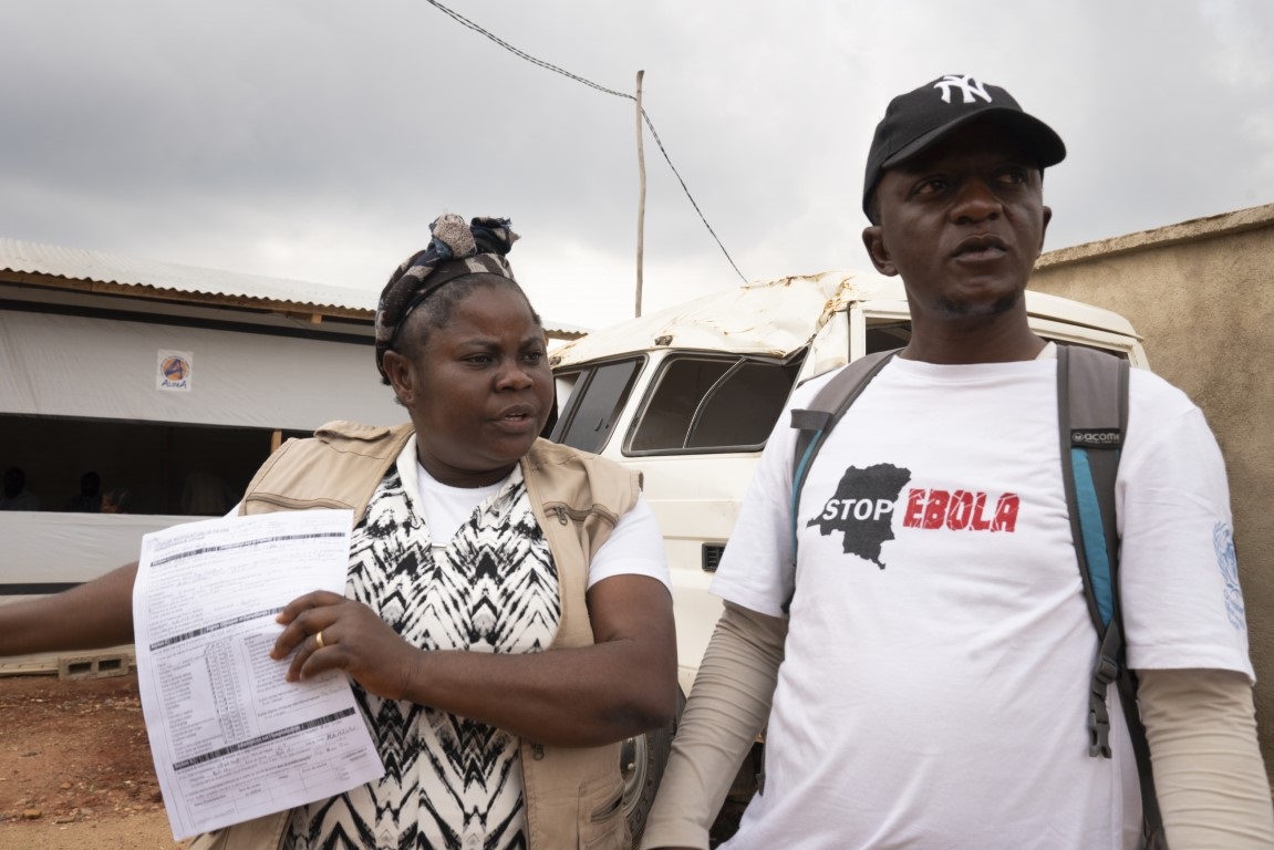 WHO_Ebola DR Congo 20JUN2019_0030-2 Two people, one wearing a Stop Ebola t-shirt