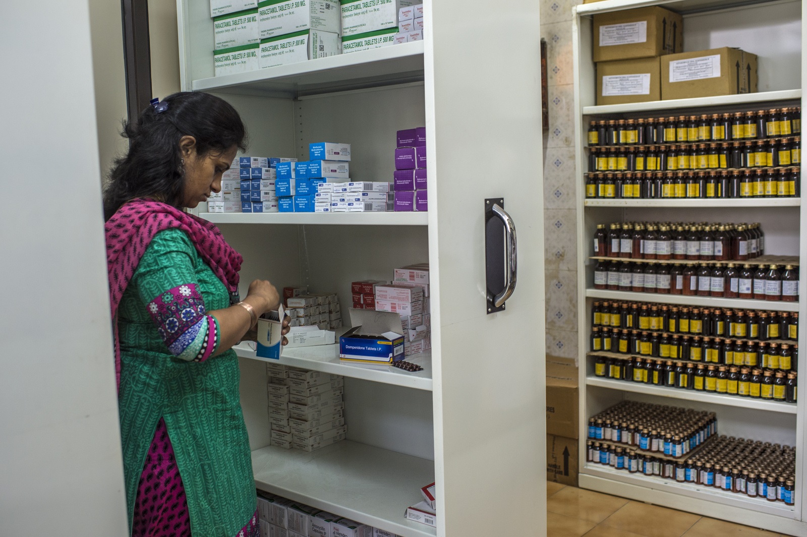 WHO_061522 hospital staff checks their stock of the diabetes medicine in the storage room
