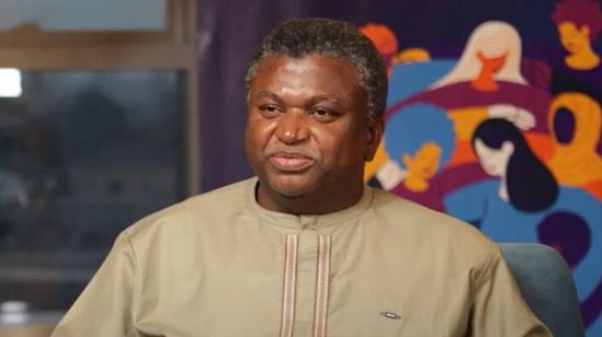 Video snapshot of Dr Ahmadou Lamin Samateh speaking on camera.