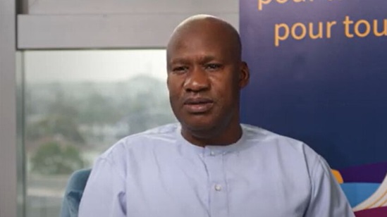 Video snapshot of Dr Ibrahima Sy speaking into the camera.