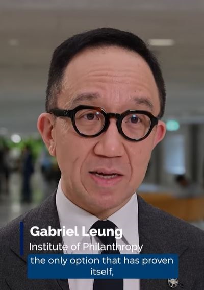 Video snapshot of Gabriel Leung talking to the camera.