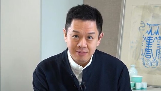 Video snapshot of James Chau talking into the camera.