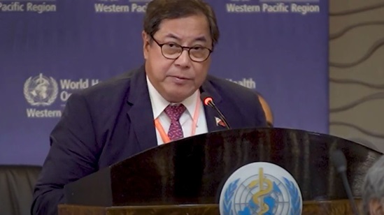 Video snapshot of Dr Teodoro Herbosa speaking at a podium, with the WHO logo, during a meeting.