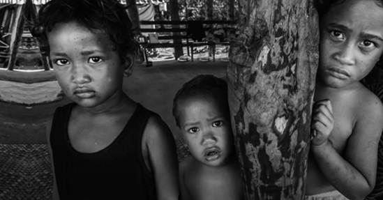 Black and white image of three children
