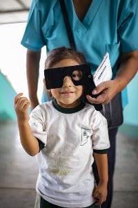 Aileen has a vision examination at her school. 