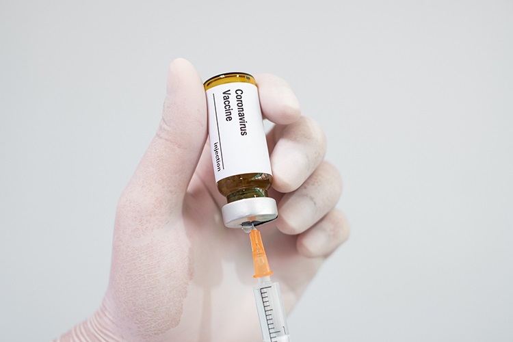 Vaccine and syringe Vaccine and syringe