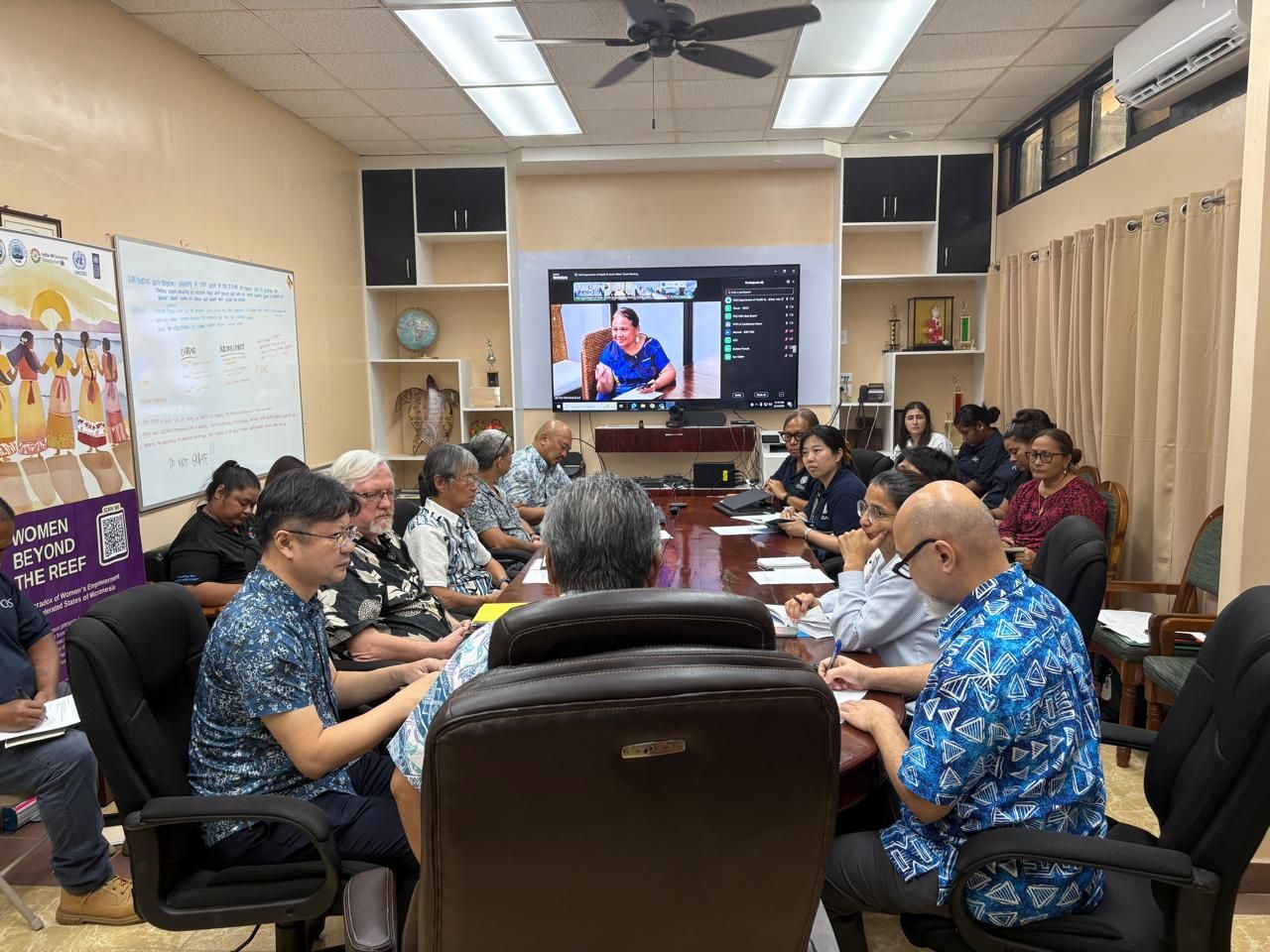 Members of the health partners coordination group discuss priority actions in response to Typhoon Sinlaku