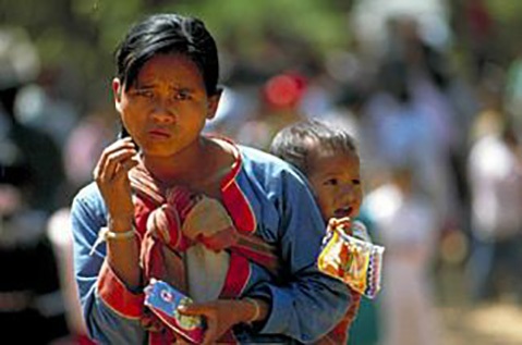 maternal_health_faq4.jpg A young mother carrying her baby in Thailand.