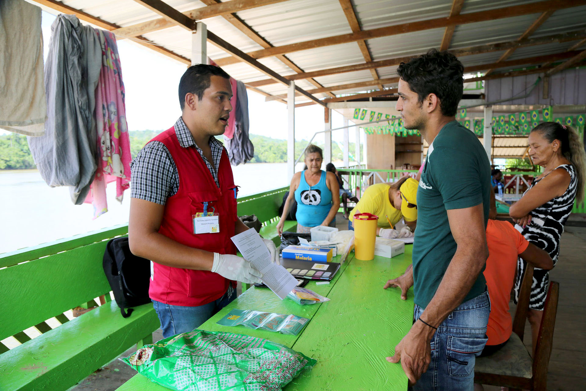 Man delivering malaria services in Suriname