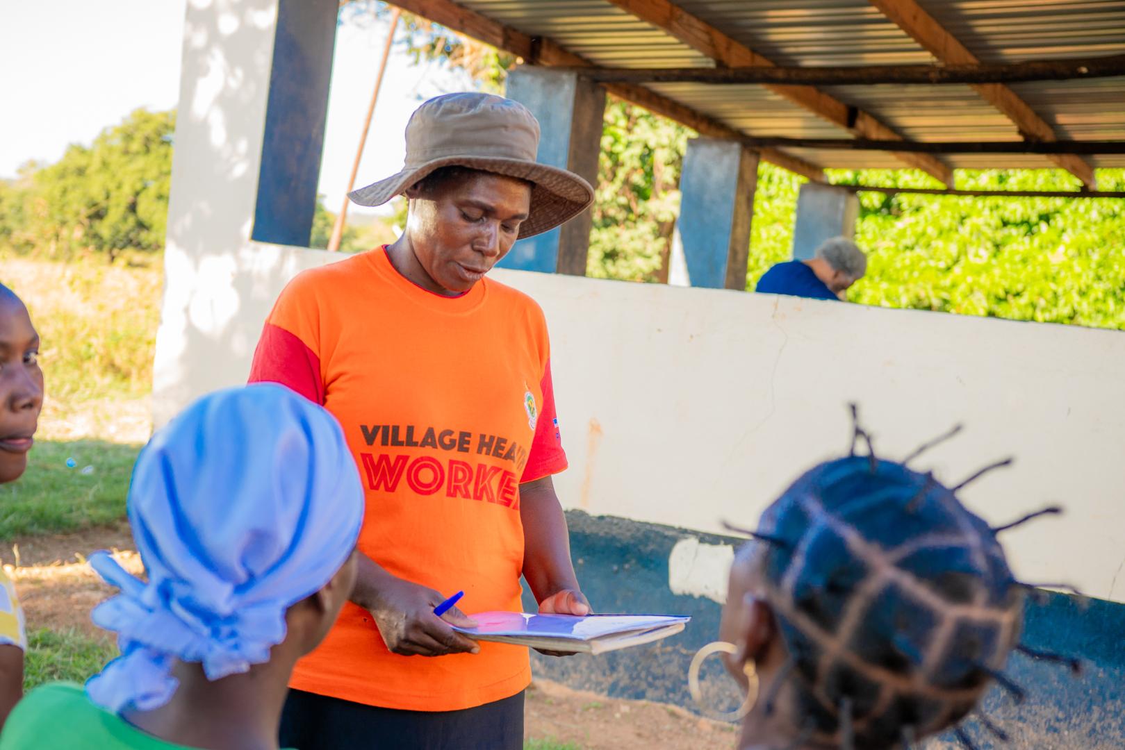 Mary providing education to women before screening