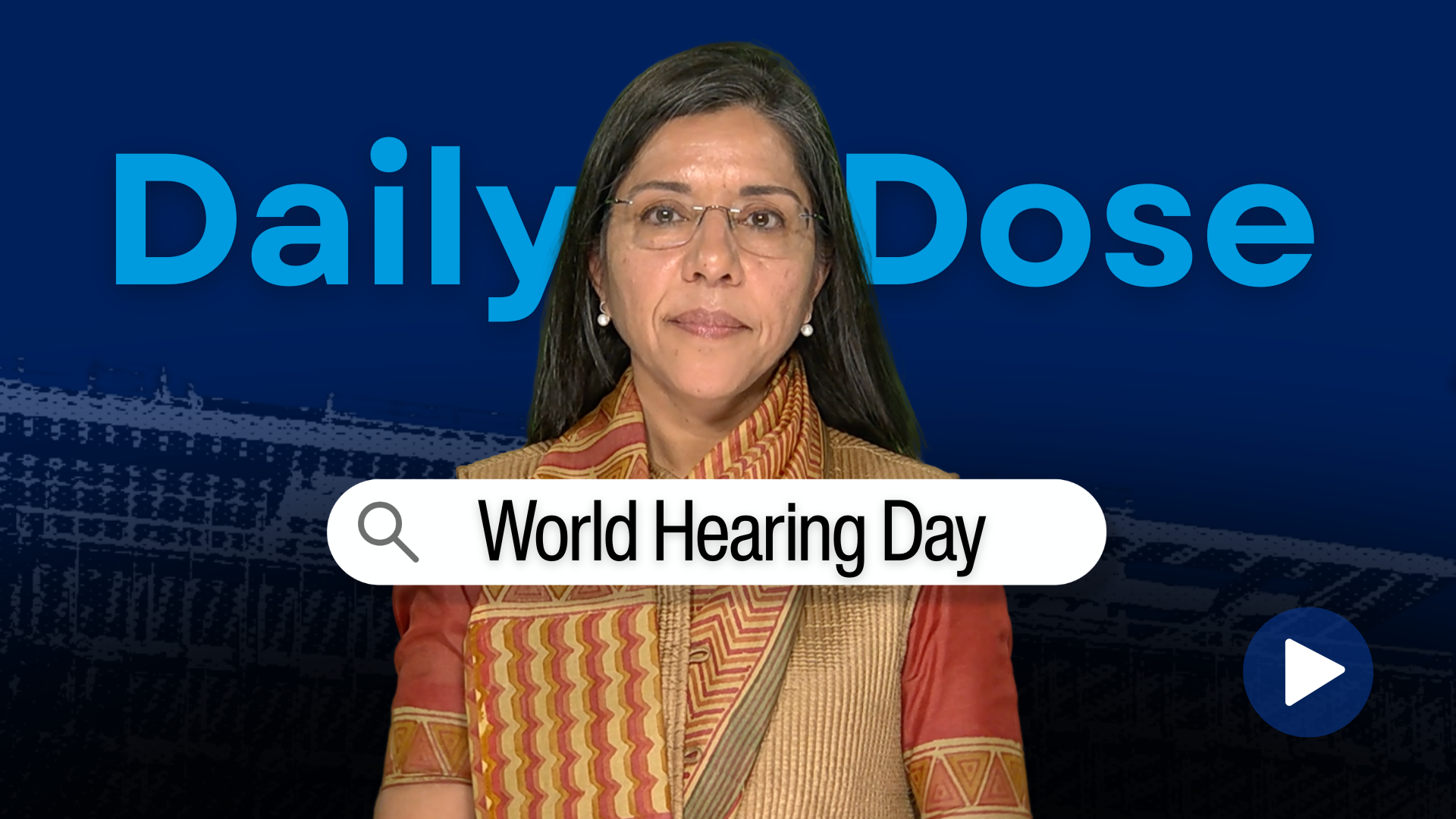 Photo of a woman standing against a blue background, with a banner marked World Hearing Day in front of her