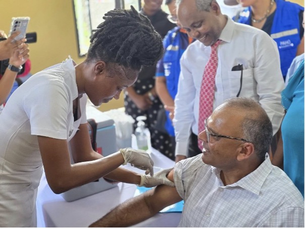PAHO story2 Minister of Health, Dr Frank Anthony receives influenza vaccine