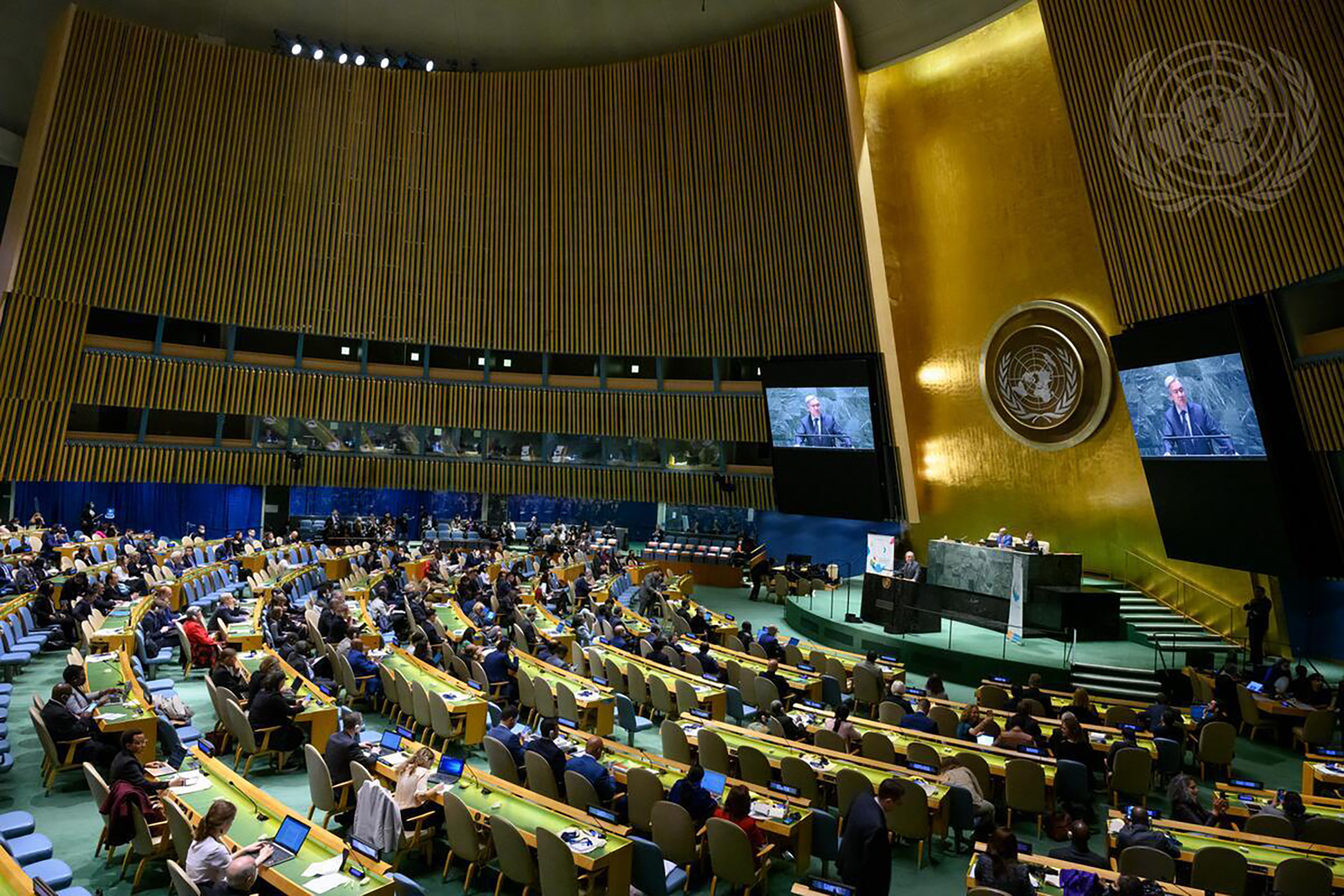 Delegates sitting in a large conference room during the UN General Assembly