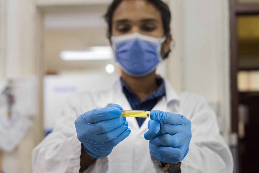 Dr Mokshanand Fhooblall works with RNA samples 