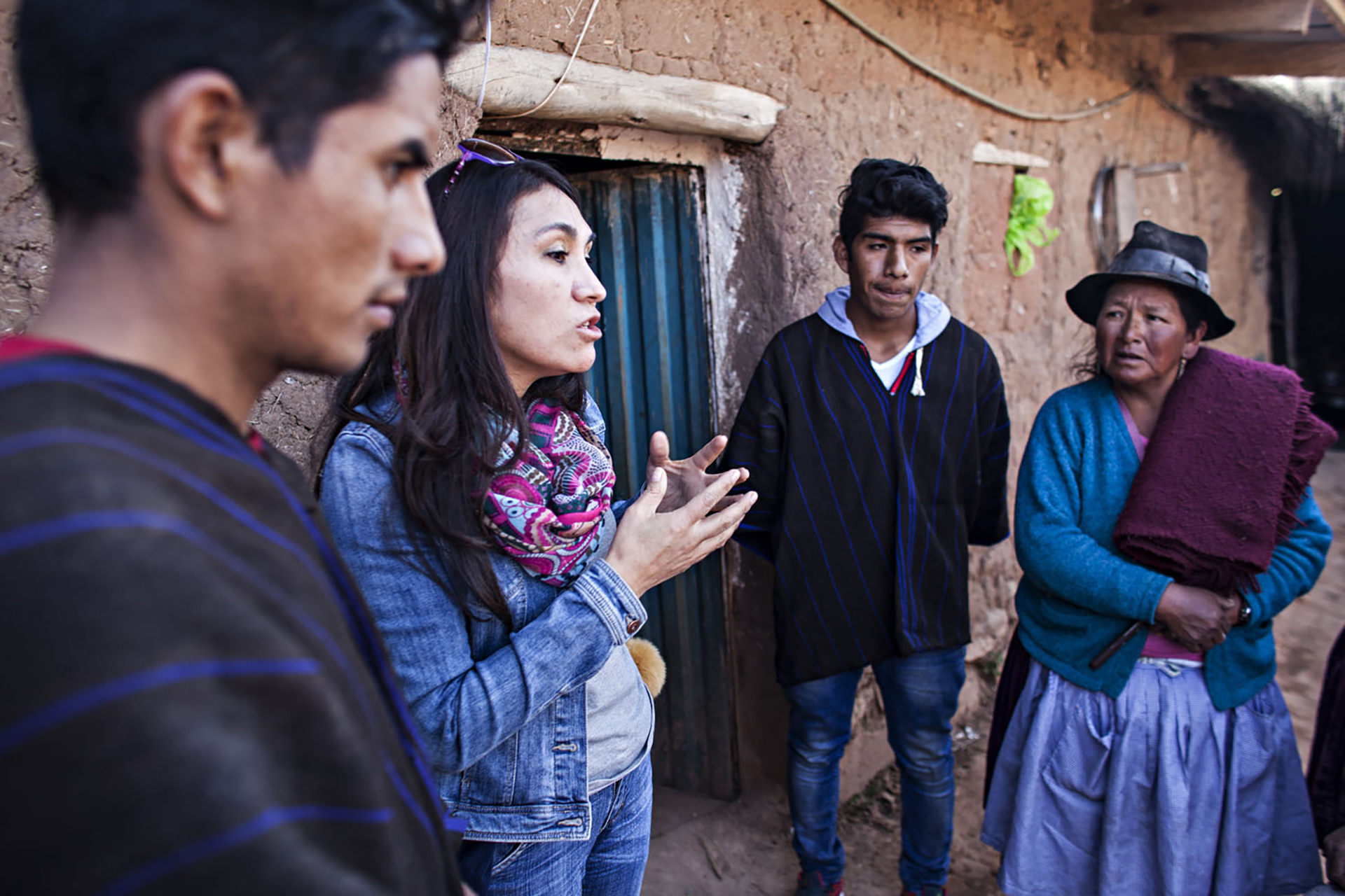 A group of people standing outside a building