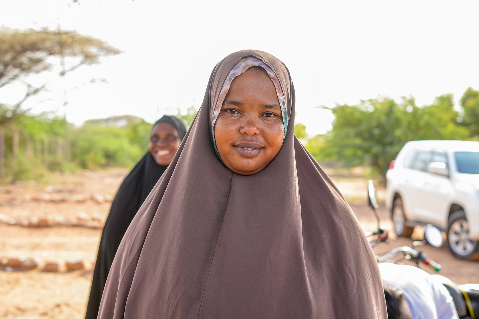 A person wearing a brown head covering