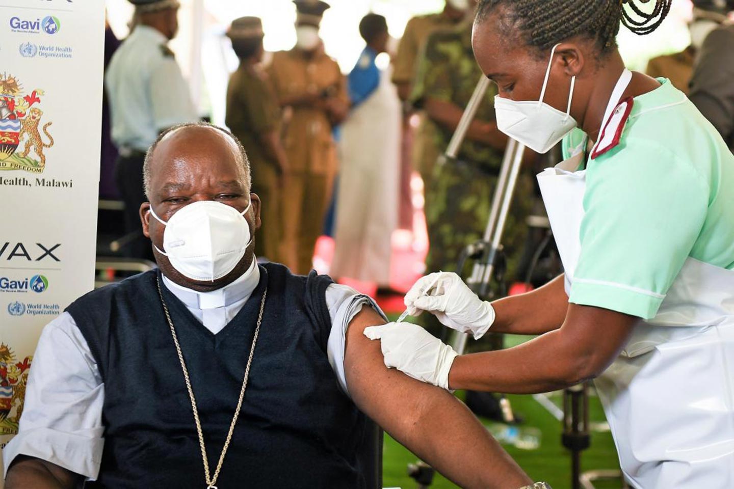 Archbishop-Thomas-Luke-Msusa-getting-vaccine-by-Thoko-Chikondi,-Unicef-Malawi_h2