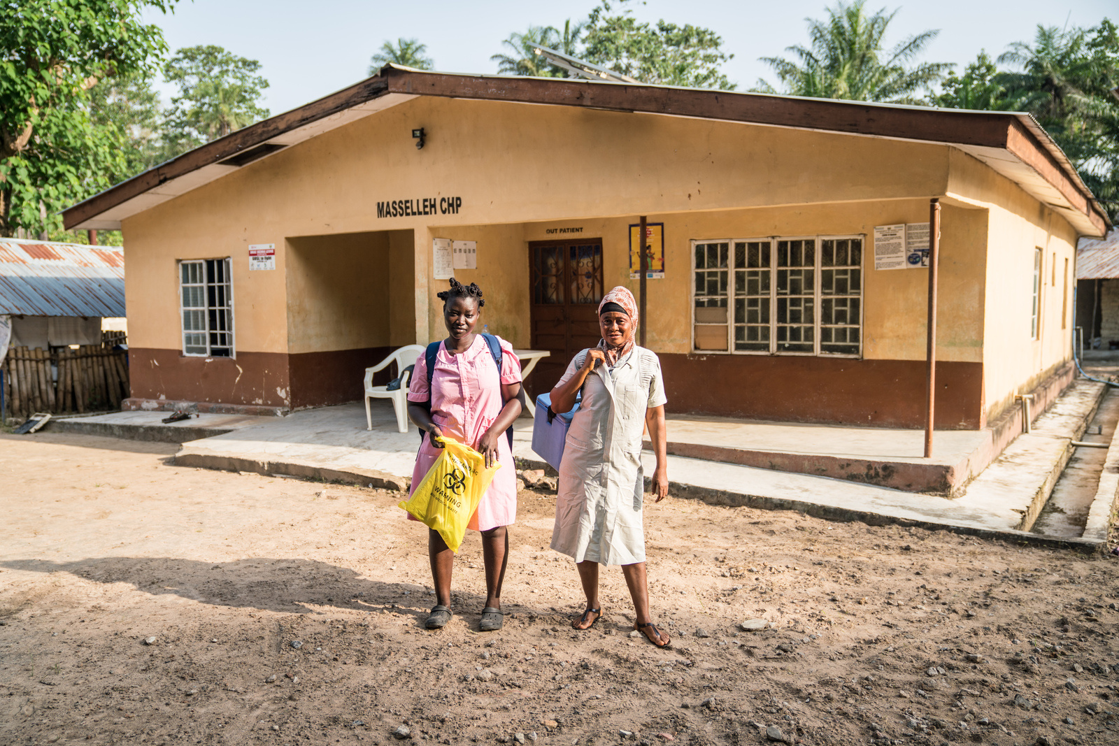 Nurse Kai (right) and Nurse at the Masselleh Community Health Post (CHP) before heading out to remote villages to conduct mobile vaccination clinics on 8 December 2022.