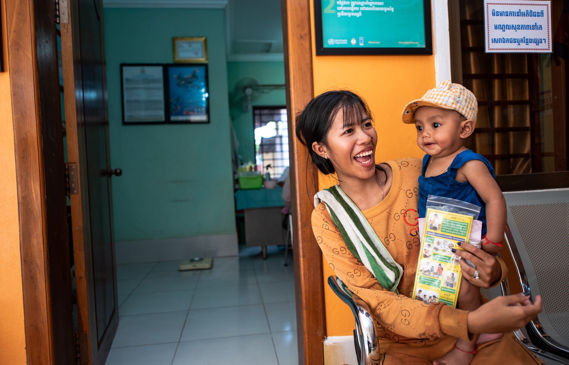 Mrs Say Sa with her Baby principal of health centre Kok Chuk, Cambodia. Mrs Say Sa with her Baby principal of health centre Kok Chuk, Cambodia.