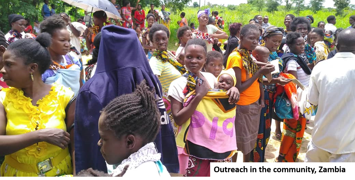 Village people gathered during a community outreach in Zambia