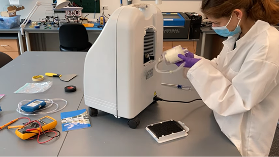 Oxygen concentrator receiving maintenance