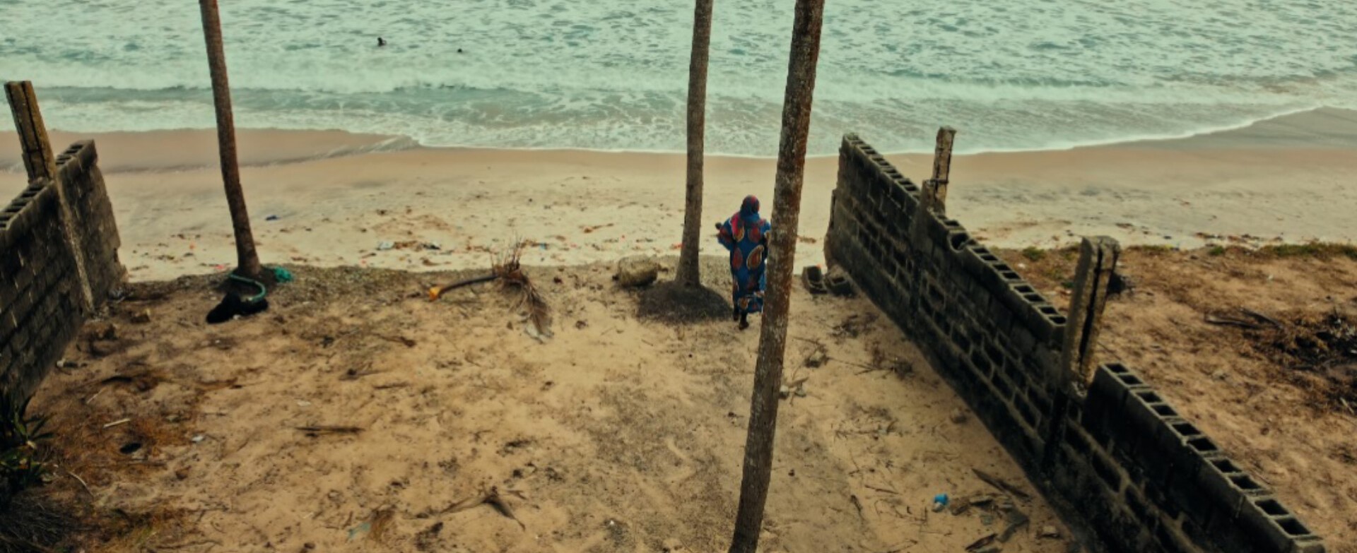 Aerial view of a migrant by the sea