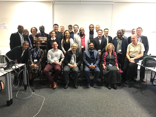 Group of people posing after a meeting on TB, in Geneva