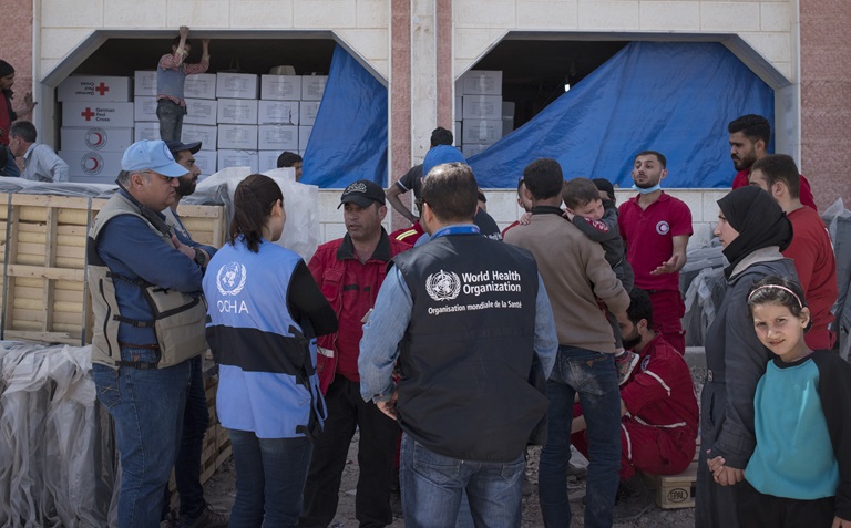WHO and partners work together to conduct an assessment at an informal settlement hosting families displaced from East Ghouta