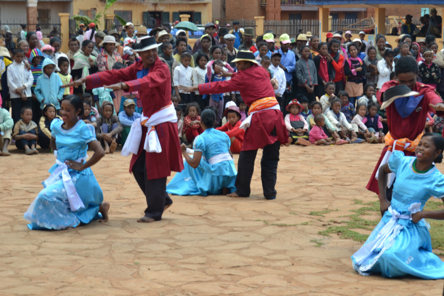 A folk dance group in Madagascar, performing a song about the tapeworm parasite to raise awareness on the disease