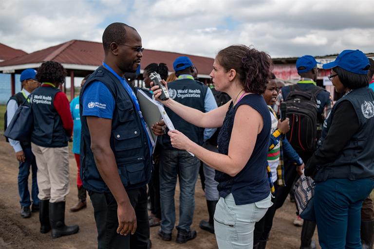 media training ministries of health africa a woman holding a microphone to a man