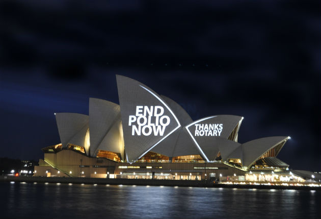 A building at night time, with the text