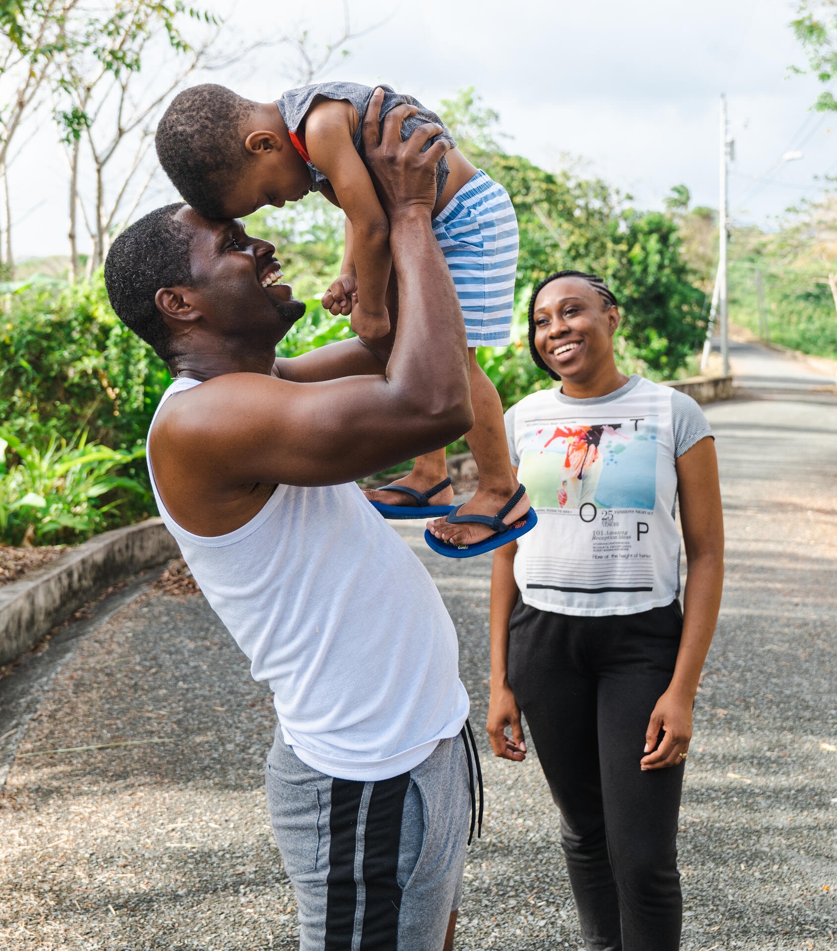 Empowering communities to prevent and self-manage NCDs. A photo depicting a couple with their child in the context of life-course and empowering communities to prevent and self-manage NCDs