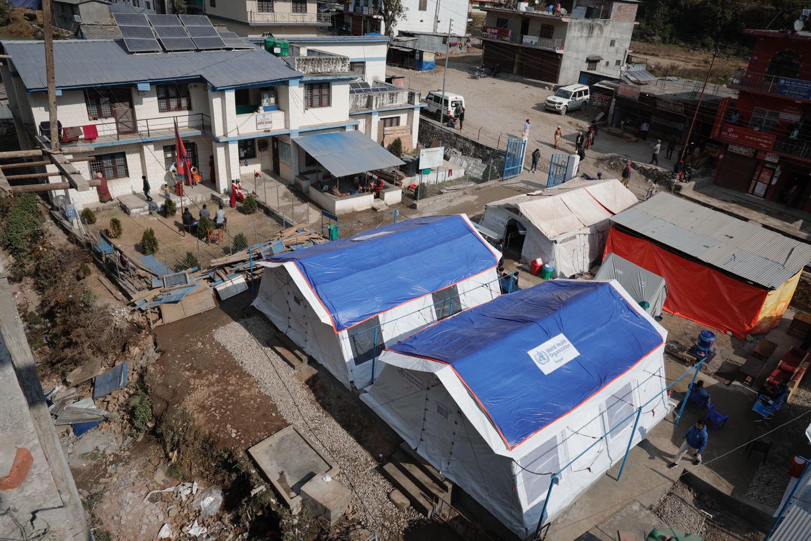 An aerial view of the second temporary health facility constructed with WHO assistance using Medical Camp Kits (MCK) in the earthquake-affected Karnali province, Nepal