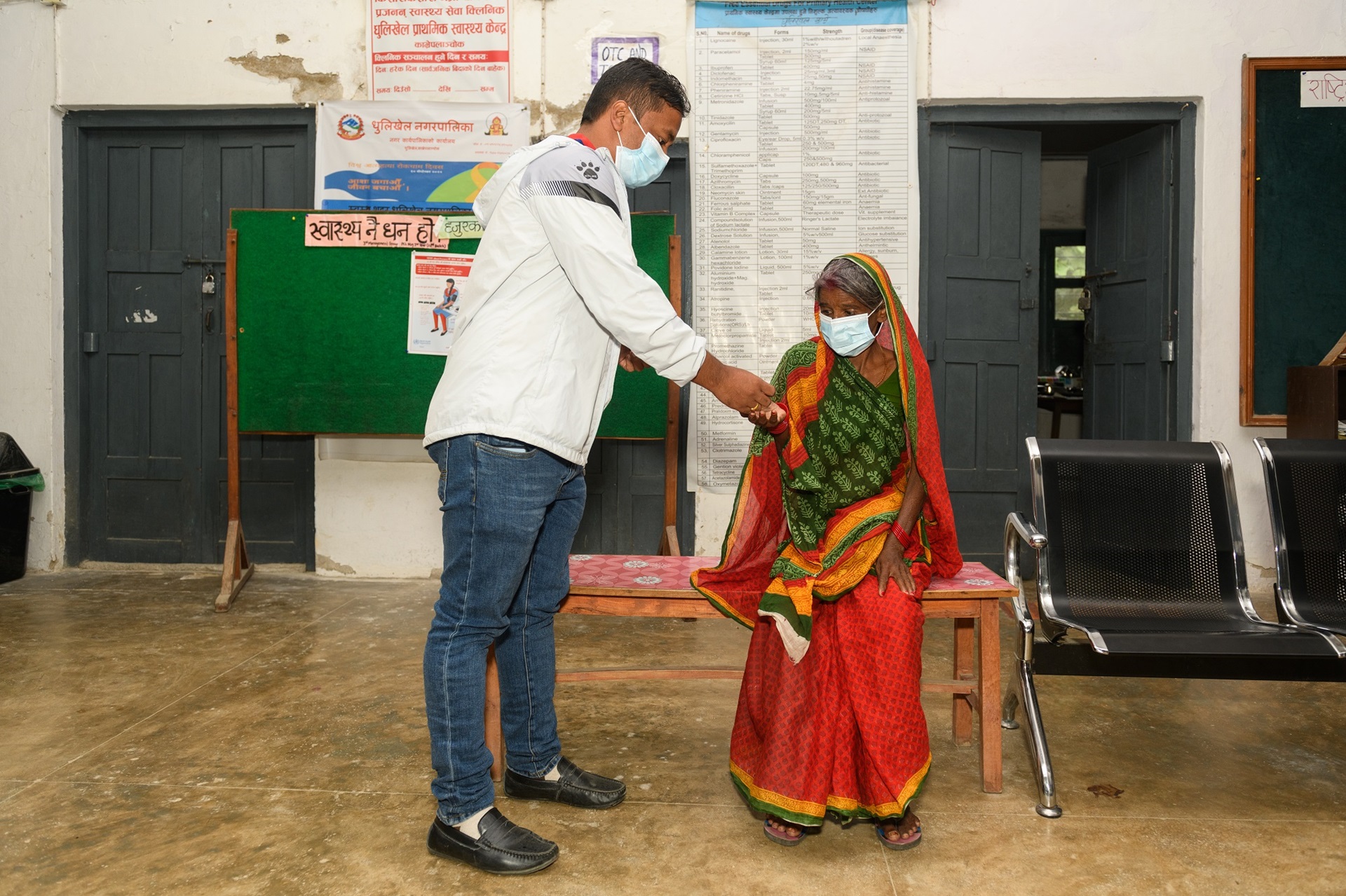 An active case-finding initiative for tuberculosis conducted in Namobuddha Municipality, Kavrepalanchok, Bagmati Province - a high-risk area among flood-affected municipalities in Nepal A woman registers herself for a free tuberculosis screening at the active case-finding camp organized in Namobuddha Municipality, Kavrepalanchok