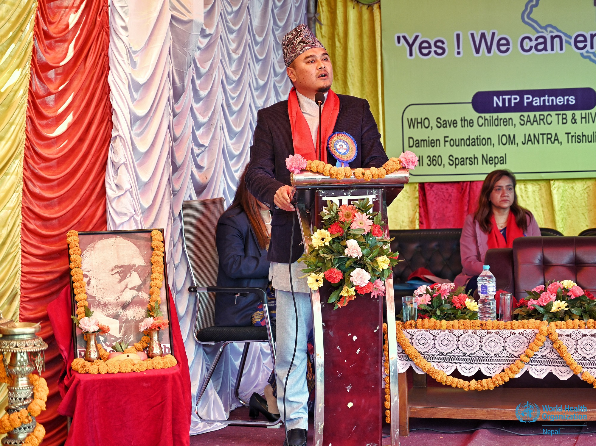 Dr Prajwal Shrestha, Director of National Tuberculosis Control Centre, providing his remarks on a podium at the commemoration of World Tuberculosis Day 2024 in Bagmati Province, Nepal