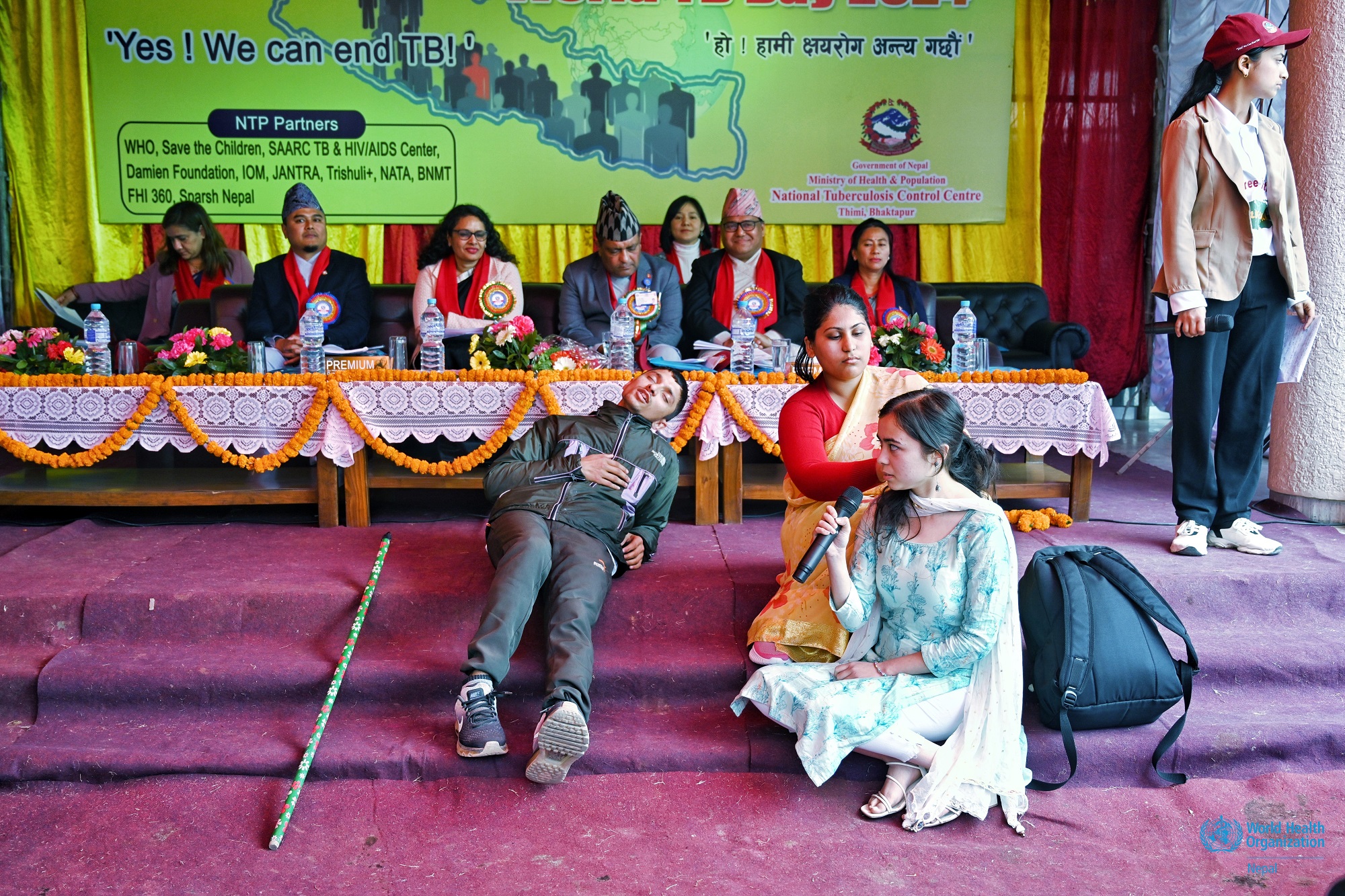 A skit being performed onstage during the commemoration of World Tuberculosis Day 2024, in Bagmati Province, Nepal, to raise awareness on tuberculosis symptoms and diagnosis