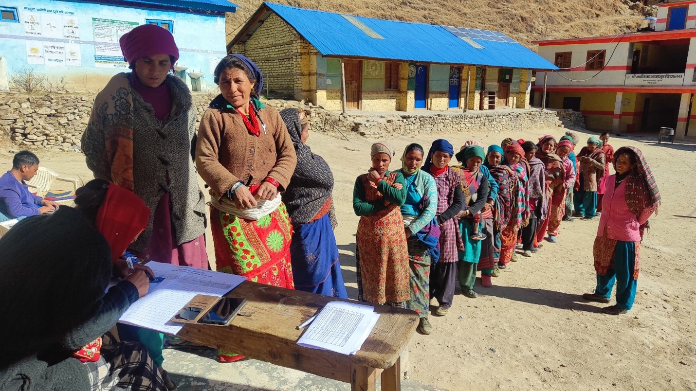 People wait in line to register their names to obtain vaccination cards during the recently concluded Typhoid Conjugate Vaccine campaign in Jumla, Karnali Province, Nepal