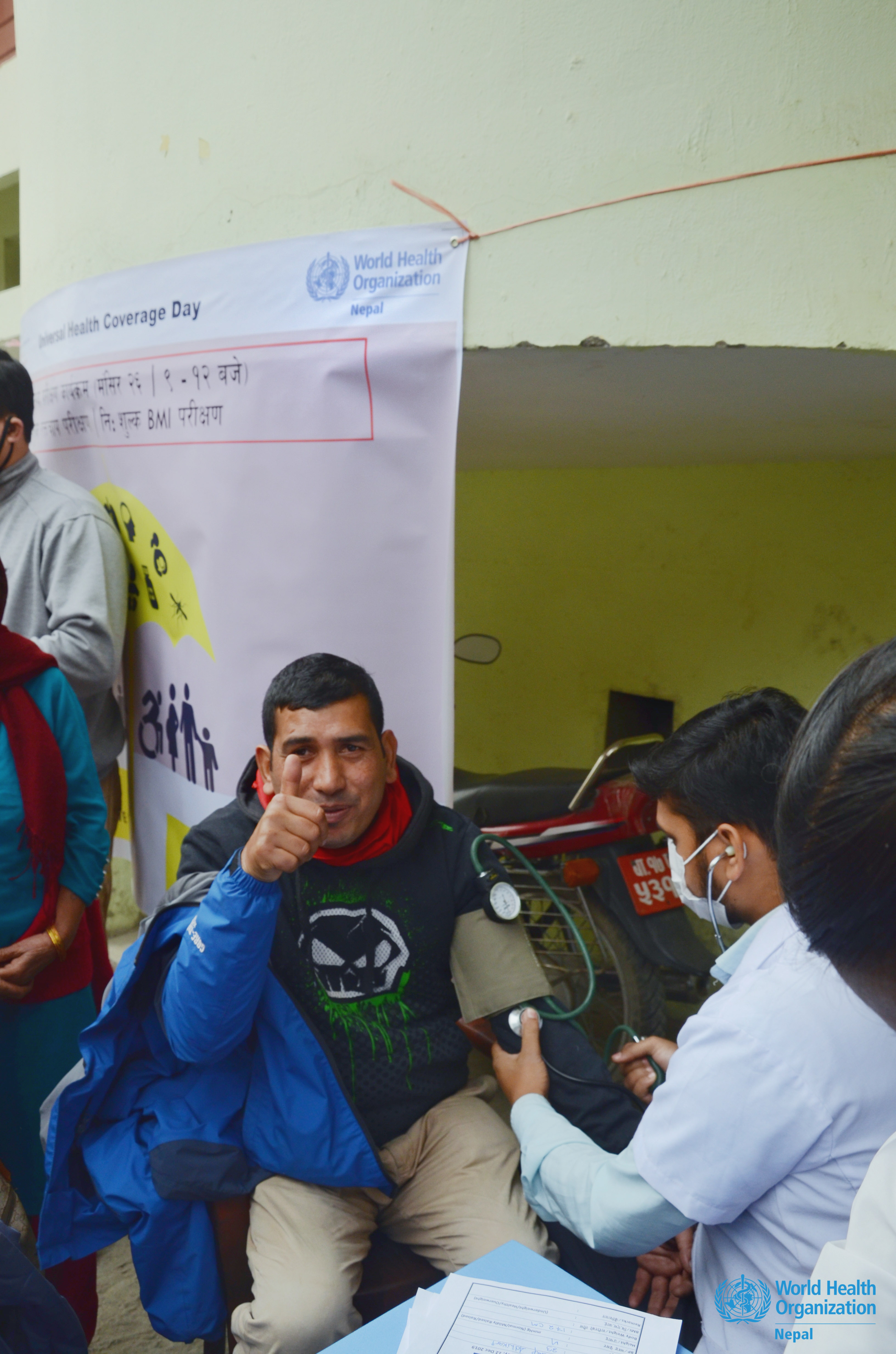 2Aserviceseekergettinghisbloodpressurecheck-upattheUHCDay2019HealthScreeningat