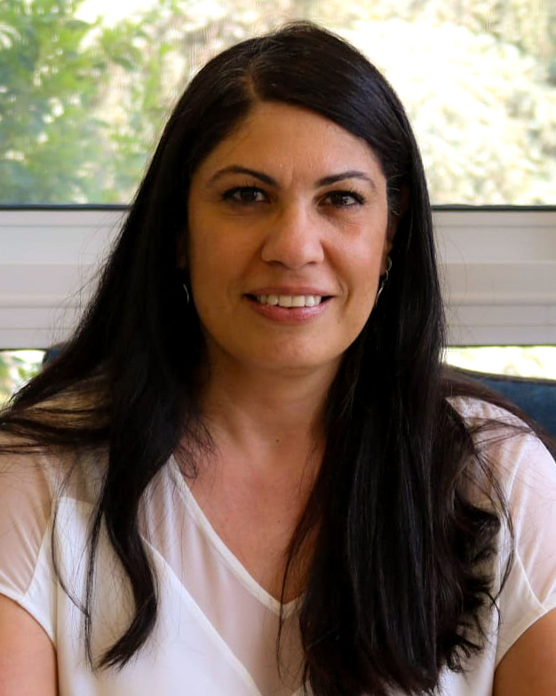 Portrait of a woman with long hair.