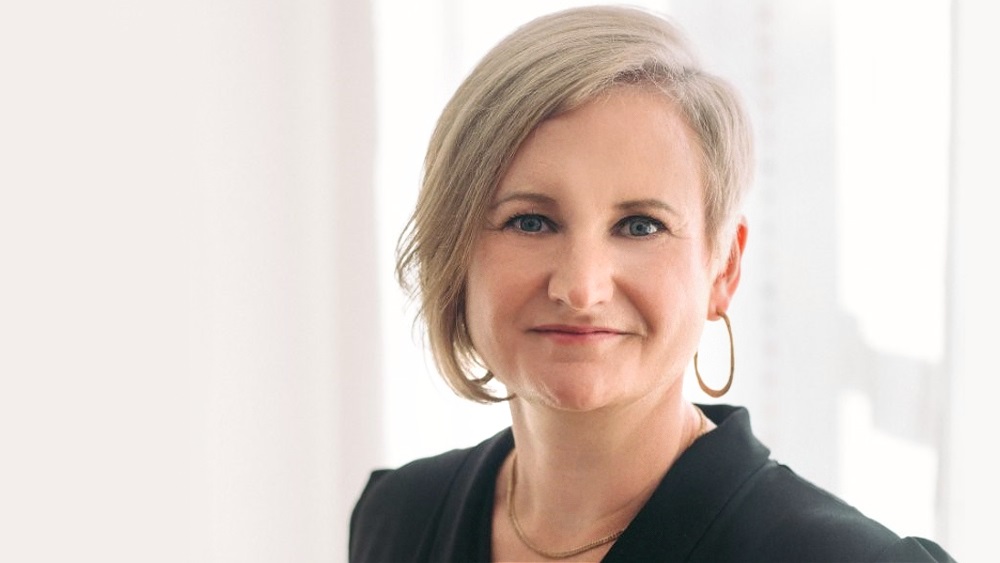 A portrait photo of a woman.