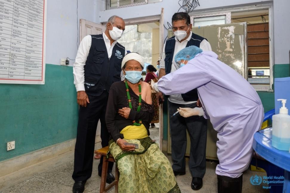 Vaccination of an elderly person in Karnali Province, Nepal