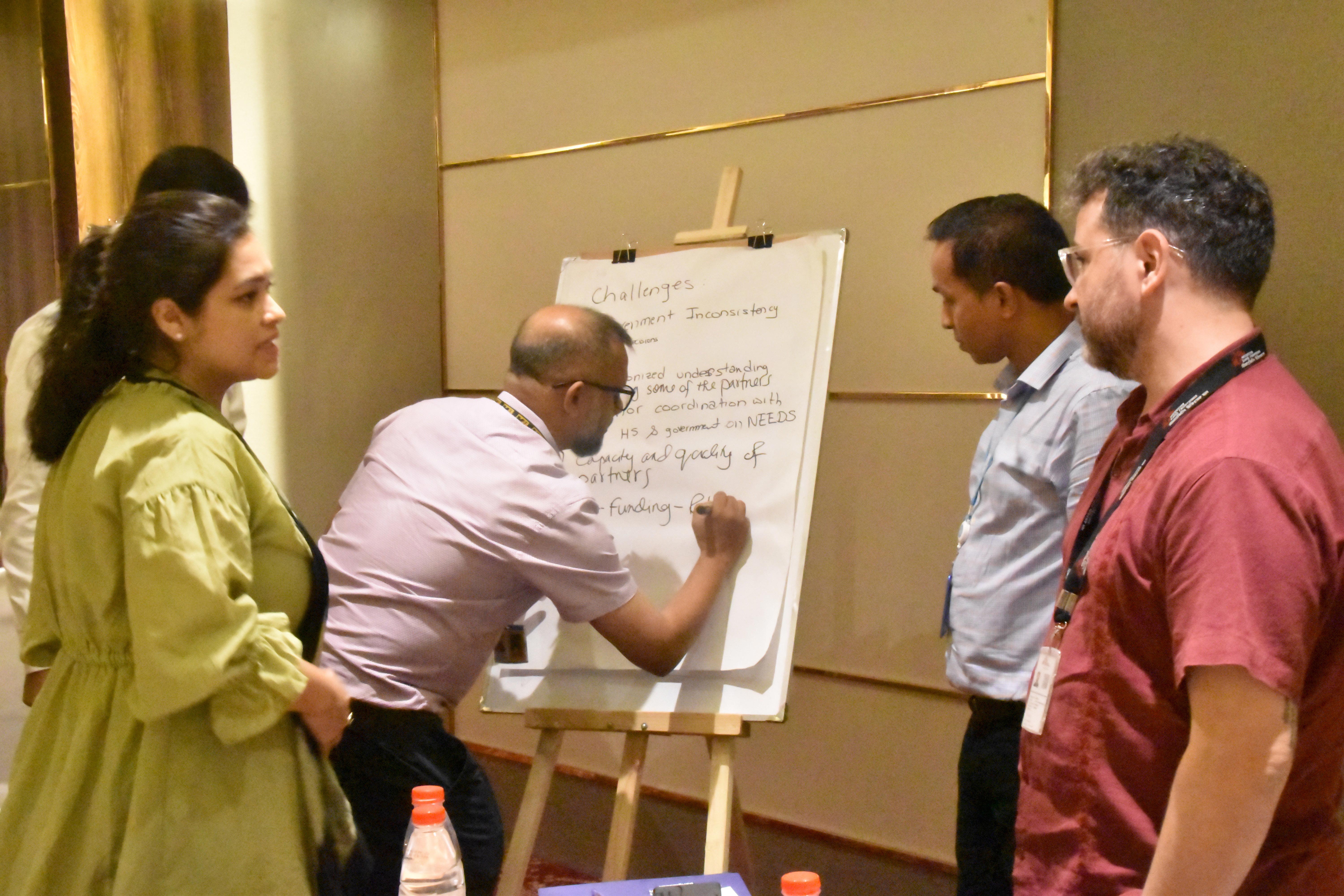 Health sector partners brainstorming strategies to address challenges in camps