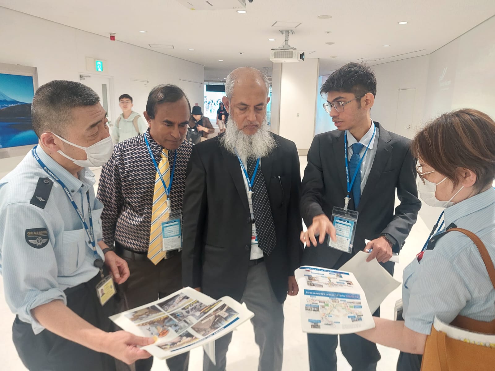 A delegation from Bangladesh and Japanese counterparts in a debriefing session on border control and quarantine at Narita Airport.