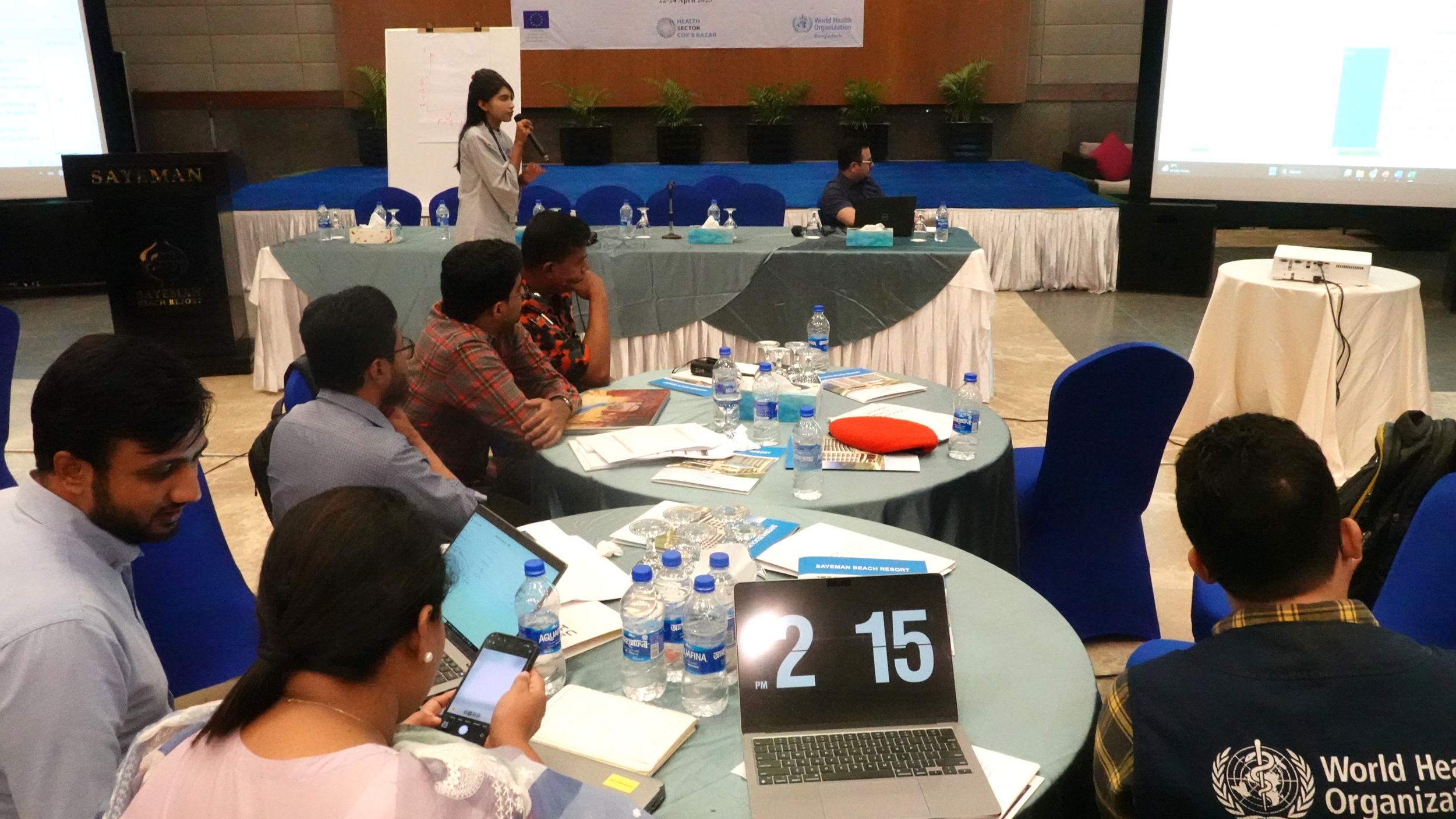 Workshop participants present their group findings  during a session in WHO Pilots First Sub-National STAR Workshop in Cox’s Bazar.
