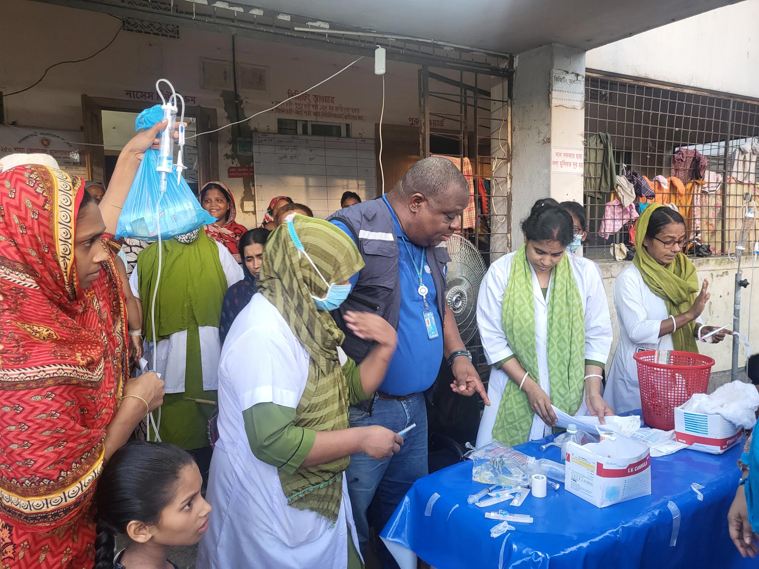 In response to the severe flooding, WHO's emergency lead observes diarrhea treatment efforts at Feni Sadar Hospital, where healthcare teams are working tirelessly to manage the health crisis caused by contaminated floodwaters