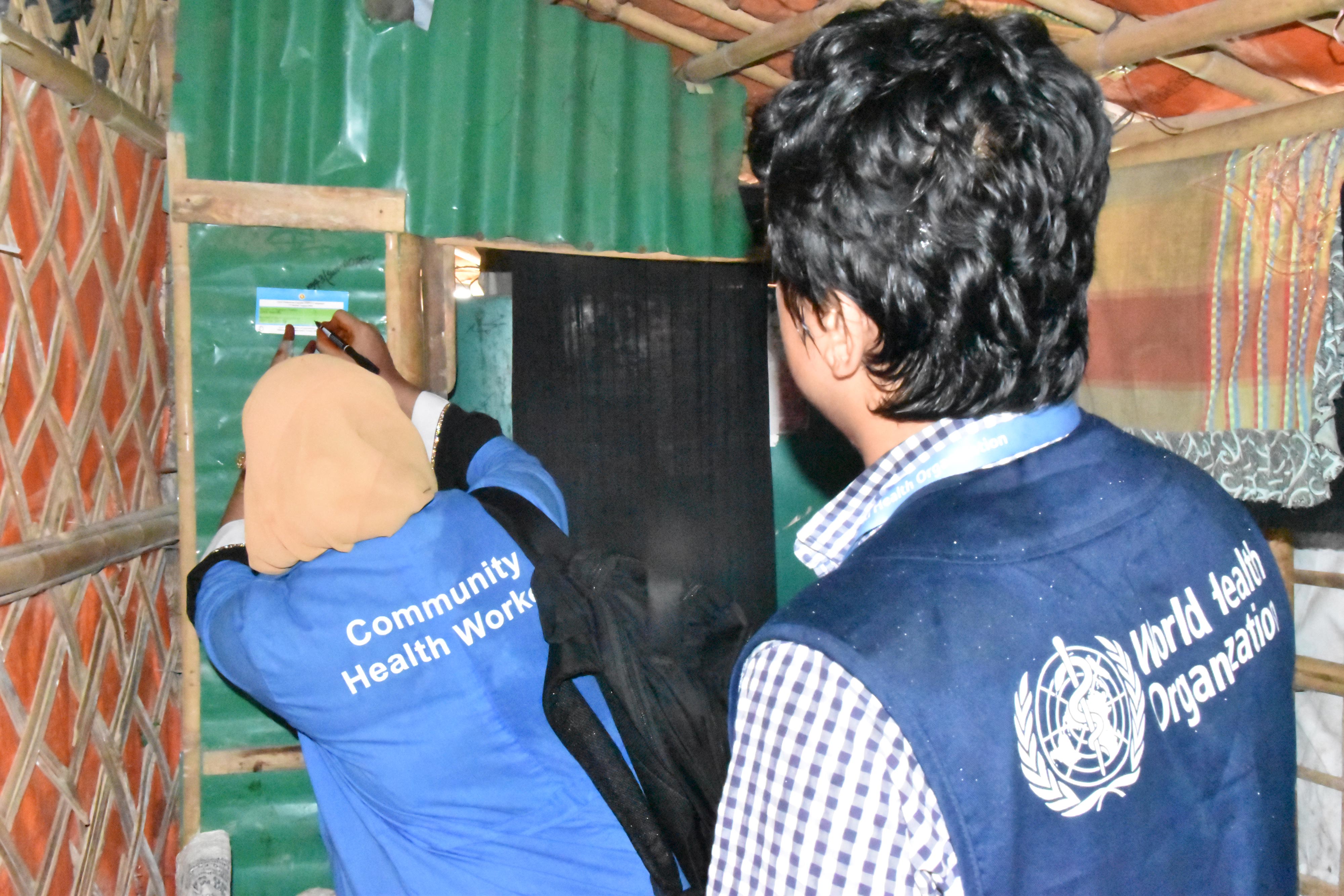 WHO staff monitoring data input for accountability in Rohingya camps