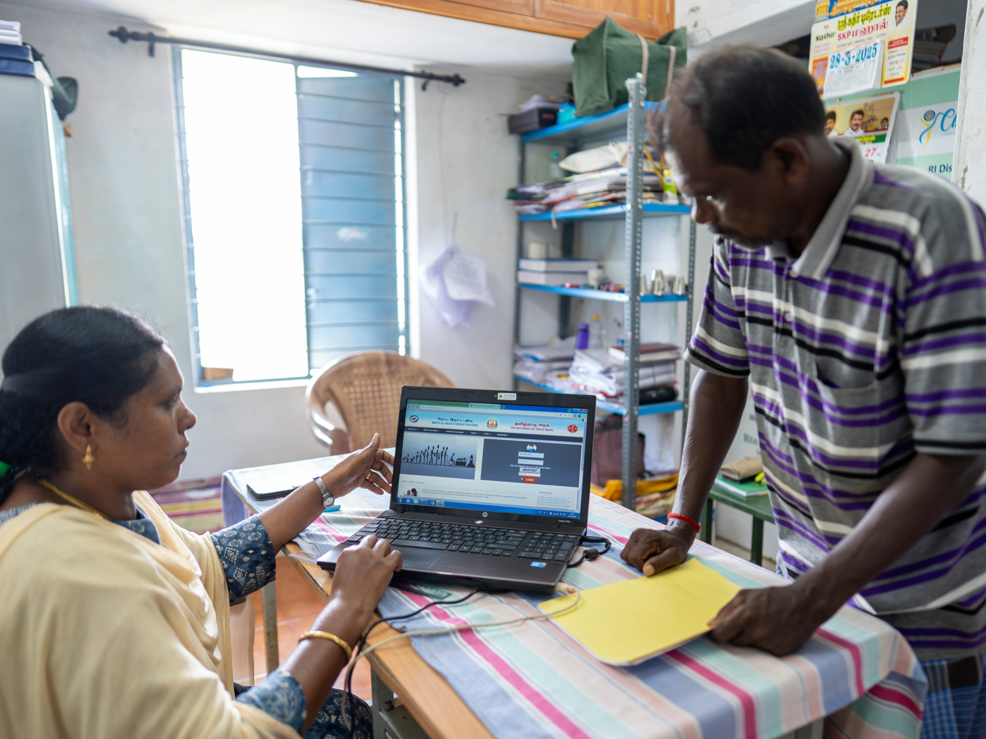 A village administrative officer (VAO) registering a death and the cause of death on the e-Mor software