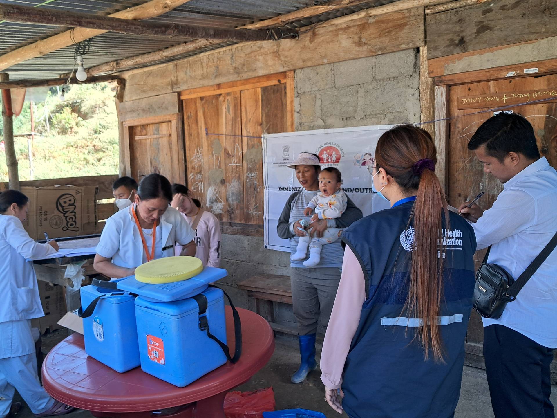 WHO team monitoring routine immunization at Community Health Centre Dirang, addressing parental concerns with local influencers.