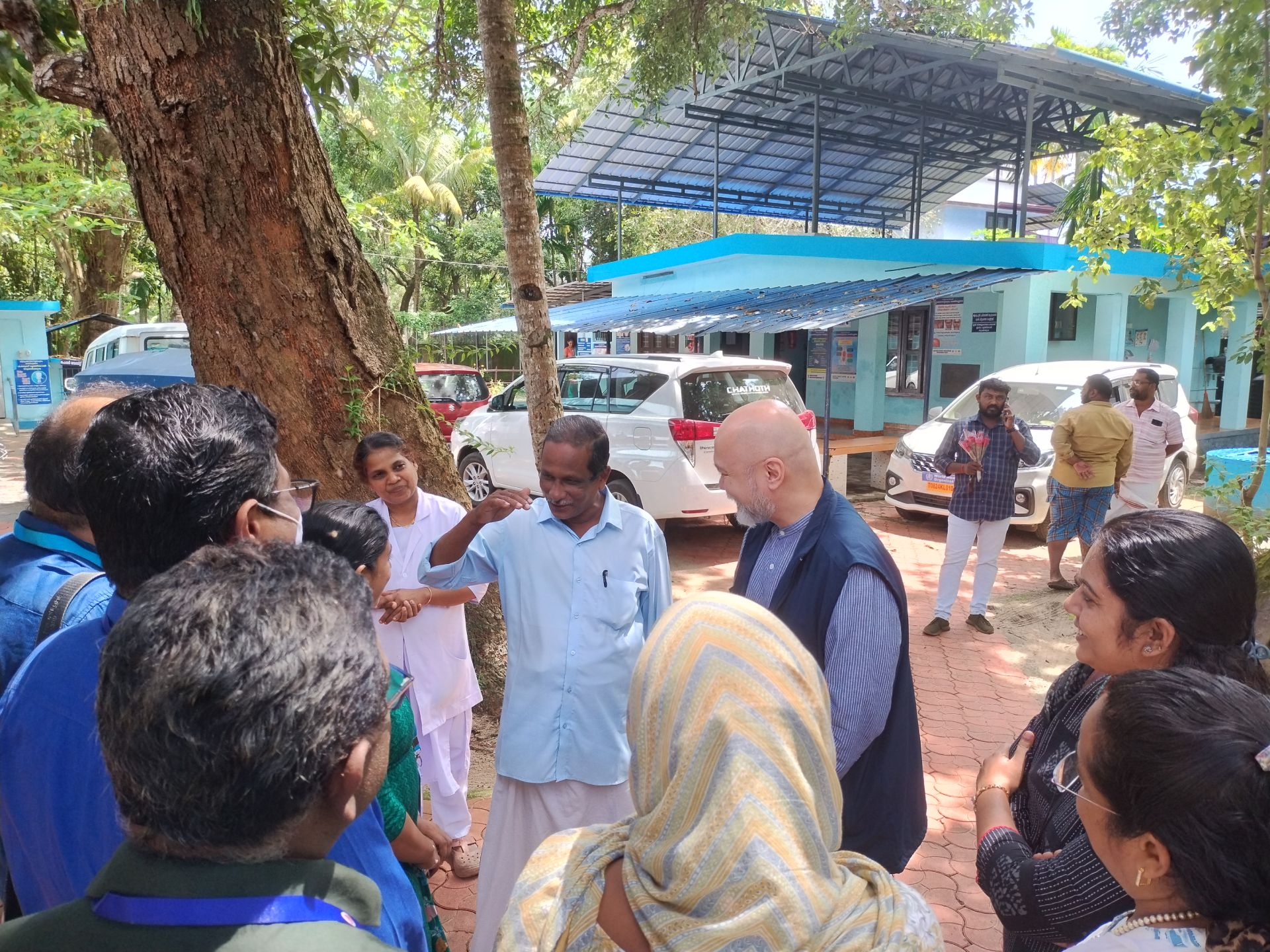 Mr M Pushpangadan, Division Councilor of Kollam Municipal Corporation talks to Dr Roderico H. Ofrin, WHO Representative to India